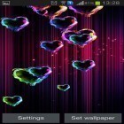 Neben Live Wallpapern für Android Gefrorene Wasserfälle kannst du die apk des Hintergrunds Magische Herzen gratis herunterladen.