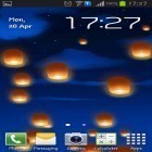 Neben Live Wallpapern für Android Eingeschneite Nachtuhr kannst du die apk des Hintergrunds Laternen im Himmel gratis herunterladen.